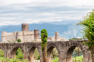 Fototapeta na wymiar Castle in the distance and aqueduct