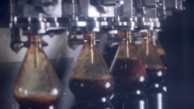 Automated modern Conveyor for the production of carbonated drink. 1080p.