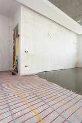 Electric floor heating system installation in new house