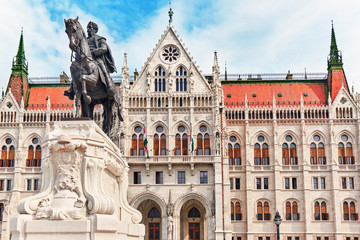 Fototapeta premium Hungarian Parliament with statue Andrassy Gyvla. Budapest.