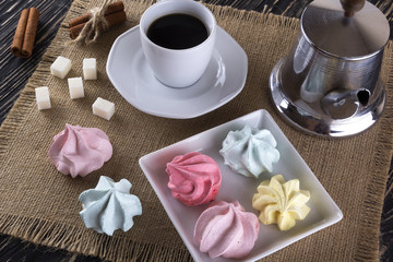 Meringue Cookies and cup of coffee.