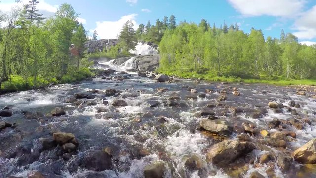 Aerial view of a beautiful river and waterfall