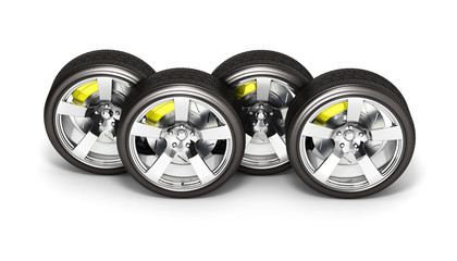 Obraz na płótnie Canvas Car wheels with brake isolated on white background 3d