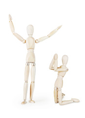 Preacher and a prayer. Abstract image with wooden puppets