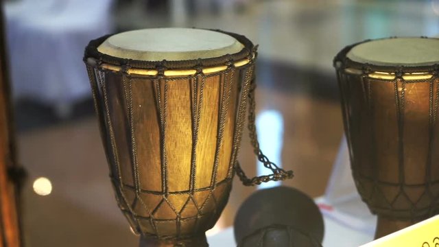 Traditional wood and leather drum of South East Asia in display. Classic music instrument