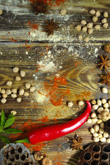 Colorful food background  - chickpea and spices on textured wood