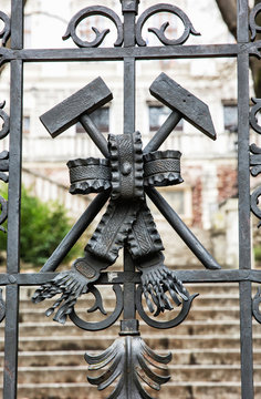 Symbol of the miners on the artistic forged gate