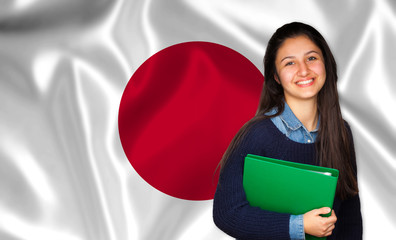 Teen student smiling over japanese flag