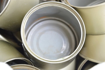 empty tin can food in sack bag