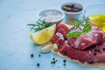 Raw meat with herbs, lemon, garlic, salt