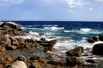 Mediterranean beach with a lot of stones