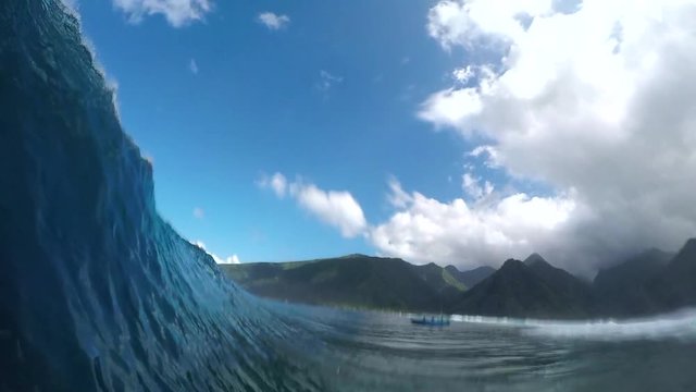 FPV SLOW MOTION: Pro surfer surfing big tube barrel wave