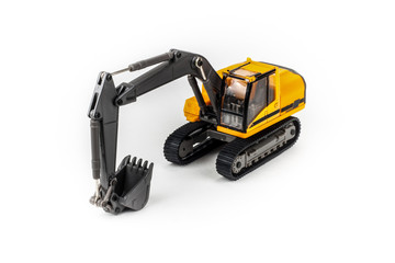 Miniature excavator isolated on white background