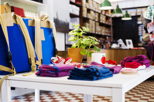 Clothes Displayed On Table In Store