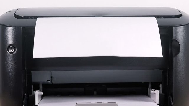 Office desktop laser printer printing single A4 letter page