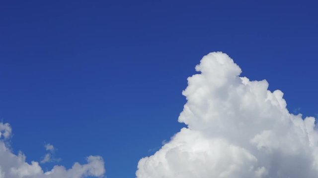Timelapse rolling clouds and blue sky