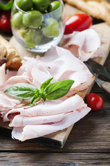 Italian antipasto with chicken ham and bread