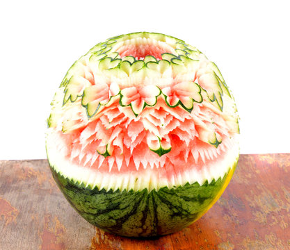 watermelon carved(Thai pattern) on wooden table