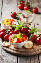 Italian sweet-sour paprika with bread and tomato