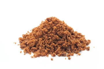 Gordijnen heap of brown sugar isolated on white background © koosen