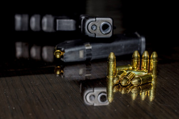 Police gun with ammunition on the table