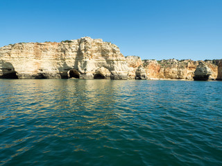 Fototapeta na wymiar A view of the rocks on the sea near the Algarve coast in Portugal, 2016