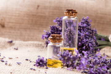 Fototapeta na wymiar spa, lavender product, oil on nature background