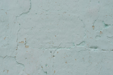 Wall fragment with attritions and cracks
