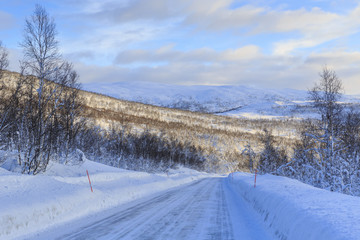 Norwegian County Road 86 in winter on Senja Island, Troms county, Norway