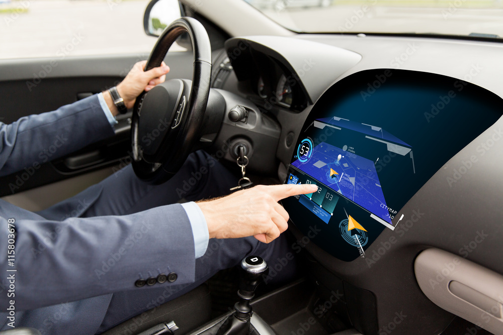 Wall mural close up of man driving car with gps navigator map