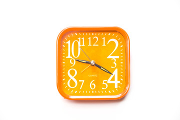 Orange alarm clock  isolated on white background,Close up orange alerm clock clipping path