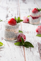 Chia seed pudding with strawberry and fresh fruits with nature background