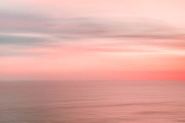 Blurred sunset sky and ocean