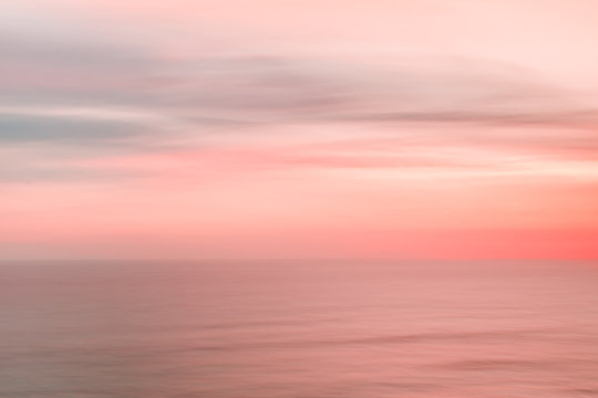 Fototapeta Blurred sunset sky and ocean