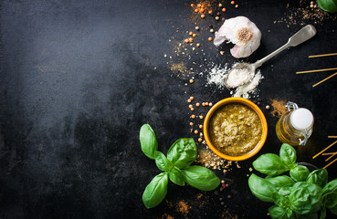 Food frame, italian food background, healthy food concept or ingredients for cooking pesto sauce on a vintage background, top view with copy space