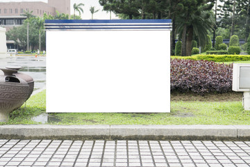 blank billboard in green park field at city park zone,Empty bill