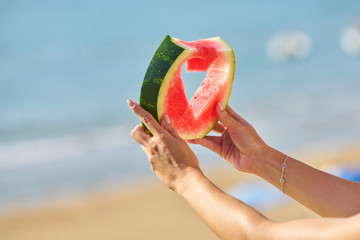 woman eating watermelon
