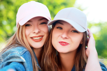 Two young girlfriends