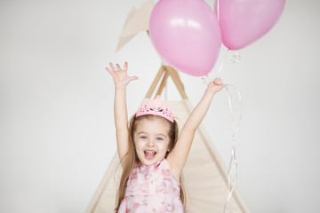 Excited kid celebrating her birthday