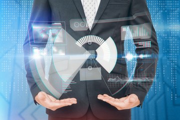 Composite image of businessman standing with hands out