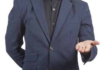 Businessman and gesture topic: a man in suit and  shirt holds out his hand on isolated white background