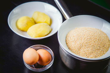 Ingredients cooked meals, boiled potatoes and eggs