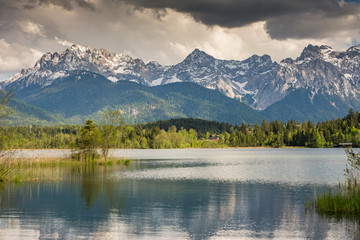 Fototapeta premium Mountains at lake Barmsee
