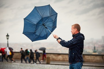 Man in rainy day