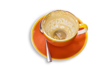 Empty orange mug of coffee latte isolated on white background