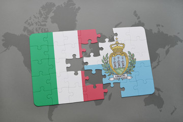 puzzle with the national flag of italy and san marino on a world map background.