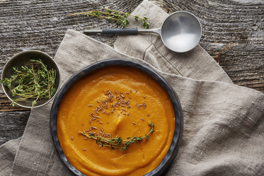 pumpkin creme soup in a dark crockery