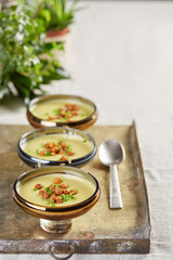 three portions of vegetable creme soup