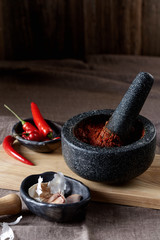 harissa in a dark mortar