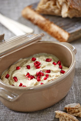 appetizing humus in a cooking pot
